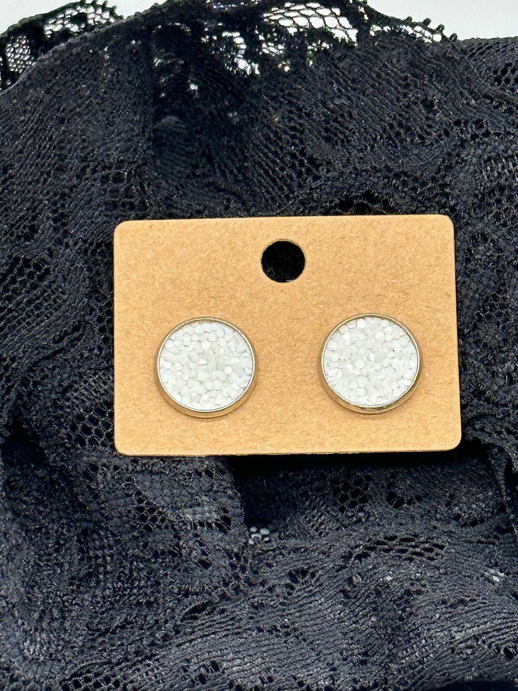 White glitter faux leather stud earrings