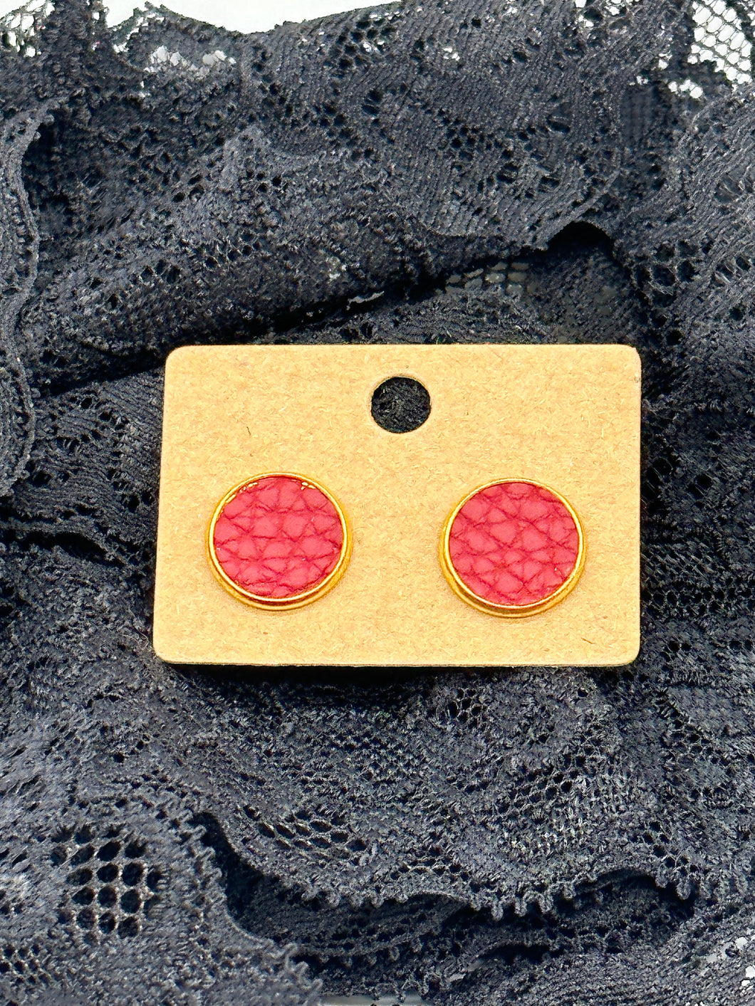 Red faux leather stud earrings