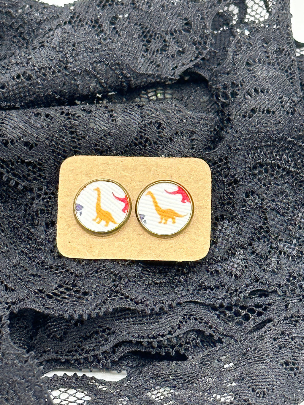 Orange dinosaur faux leather stud earrings