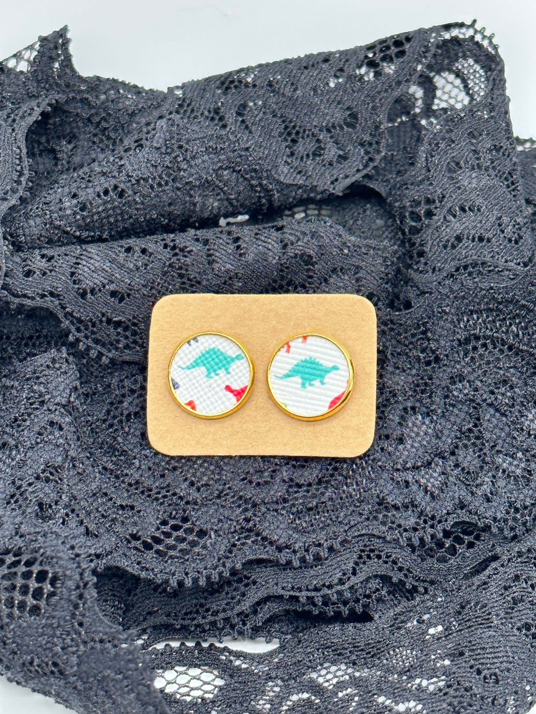 Teal dinosaur faux leather stud earrings