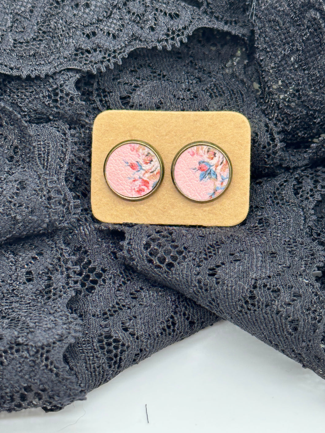 Floral faux leather stud earrings