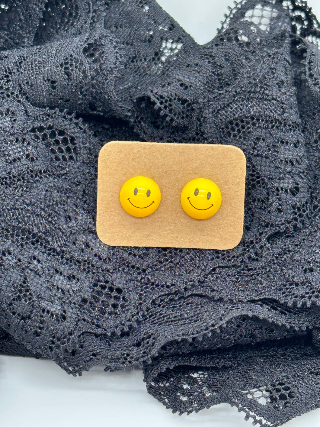 Smiley face stud earrings