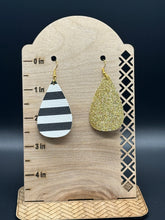 Load image into Gallery viewer, Black and white striped faux leather earrings
