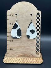 Load image into Gallery viewer, Cow print faux leather earrings
