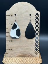 Load image into Gallery viewer, Cow print faux leather earrings
